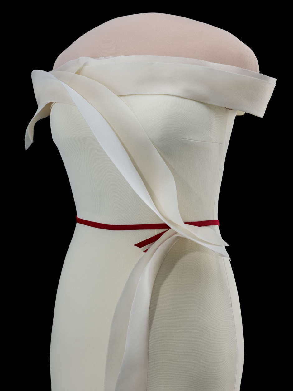 "You don't have a lot of fuss and ruffles and ideas and drapes and print whatever," the designer said. "In two lines, you have the essence and you have the spirit of that gown." Designer Hervé Pierre said he likes the gown for its simplicity. (Courtesy Smithsonian's National Museum of American History)