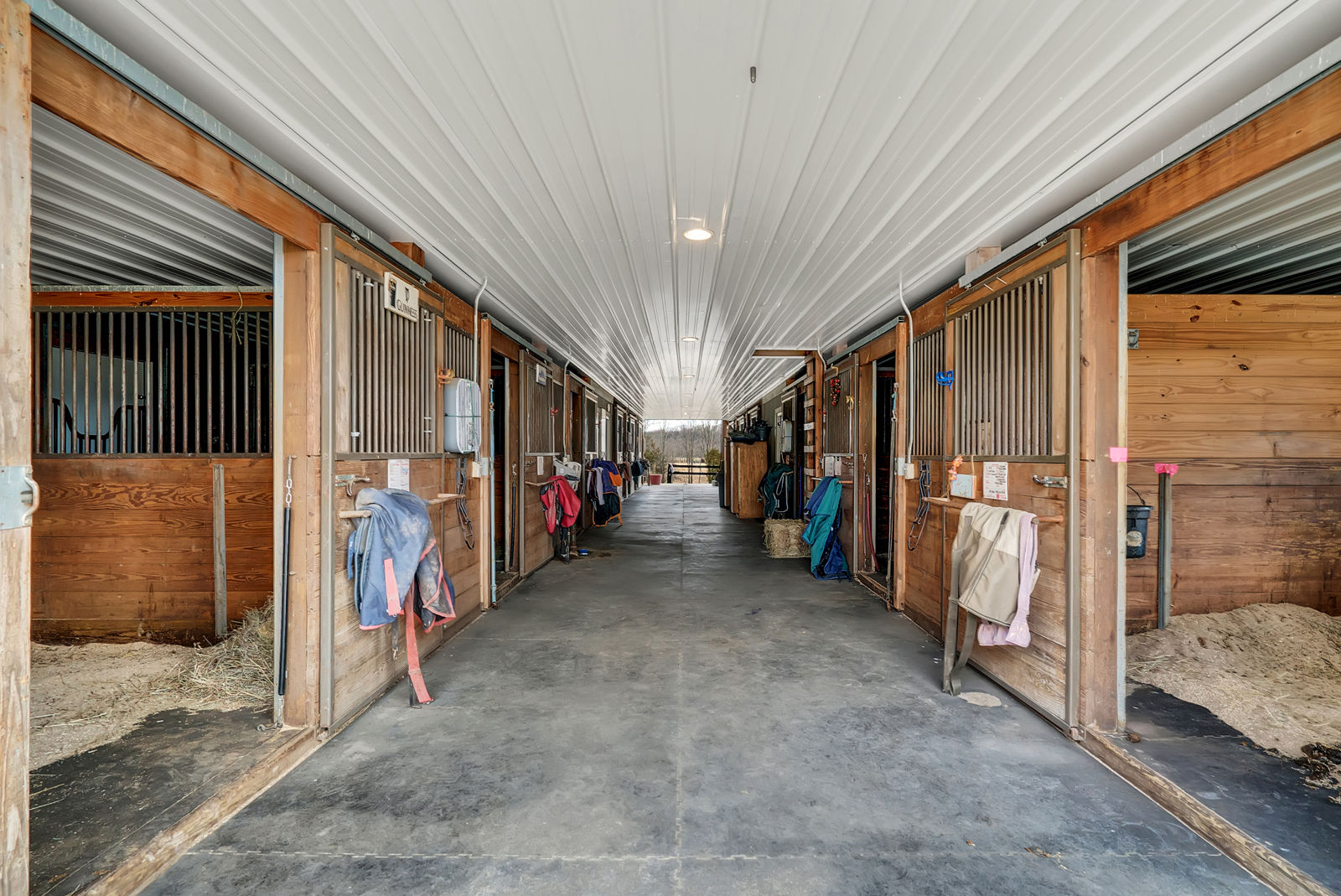 The property also includes an 11,200-square-foot indoor riding arena, two show arenas and stables and offers boarding and training. It also hosts regular events, including seven Virginia Horse Show Association Hunter/Jumper shows booked for 2017, according to the listing. (Courtesy Auction Markets LLC)
