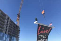 The Cordish Companies completed the exterior phase of construction of the flagship hotel with the placement of the final steel beam in what is traditionally called a "topping off" ceremony. (Courtesy Cordish Co.)