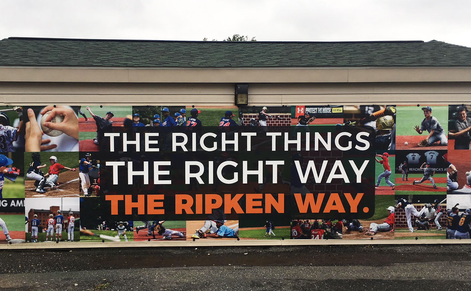 A banner advertising "The Ripken Way" adorns a building on the Aberdeen campus of The Ripken Experience. (WTOP/Noah Frank)