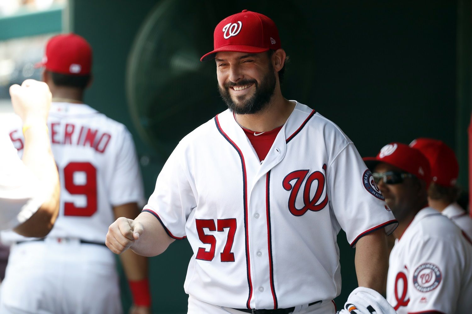 Washington Nationals starting pitcher Tanner Roark smiles in the dugout before an interleague baseball game against the Los Angeles Angels at Nationals Park Wednesday, Aug. 16, 2017, in Washington. (AP Photo/Alex Brandon)