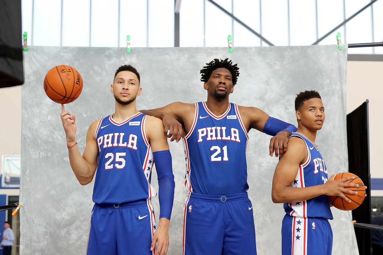 CAMDEN, NJ - SEPTEMBER 25:  Ben Simmons #25, Joel Embiid #21 and Markelle Fultz #20 of the Philadelphia 76ers pose for the camera during the Philadelphia 76ers Media Day on September 25, 2017 at the Philadelphia 76ers Training Complex in Camden, New Jersey.NOTE TO USER: User expressly acknowledges and agrees that, by downloading and/or using this photograph, user is consenting to the terms and conditions of the Getty Images License Agreement.  (Photo by Abbie Parr/Getty Images)