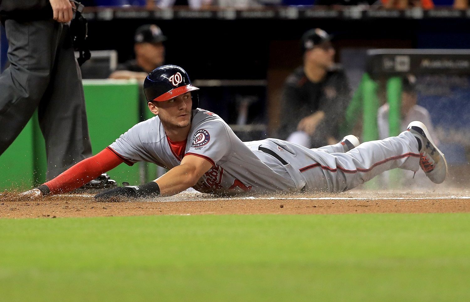 MIAMI, FL - SEPTEMBER 06:  Trea Turner #7 of the Washington Nationals slides home in the first inning during a game against the Miami Marlins at Marlins Park on September 6, 2017 in Miami, Florida.  (Photo by Mike Ehrmann/Getty Images)