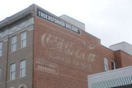 At the True Reformer Building (1200 U St. NW), a Coca-Cola sign has endured the years. (WTOP/Dave Dildine)