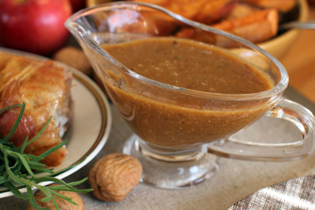 This Oct. 12, 2015, photo shows a roasted Thanksgiving turkey gravy in Concord, N.H. Regardless of how you cook the turkey, experts say to make sure you let it sit, undisturbed, on a cutting board or platter for at least 30 minutes before carving. This allows the bird to finish cooking more gently and reabsorb all of its juices, producing moist meat. (AP Photo/Matthew Mead)