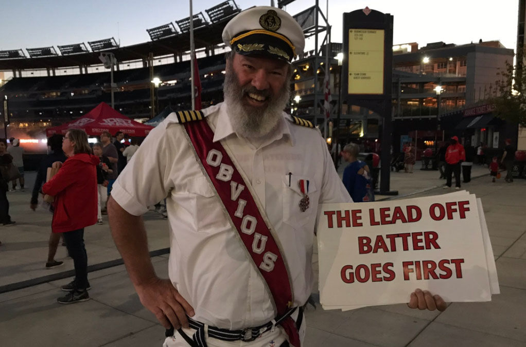 A baseball fan is dressed as Hotels.com's spokesman Captain Obvious during a "Haunted Pep Rally" at Nationals Park, Oct. 4, 2017. (WTOP/Michelle Basch)