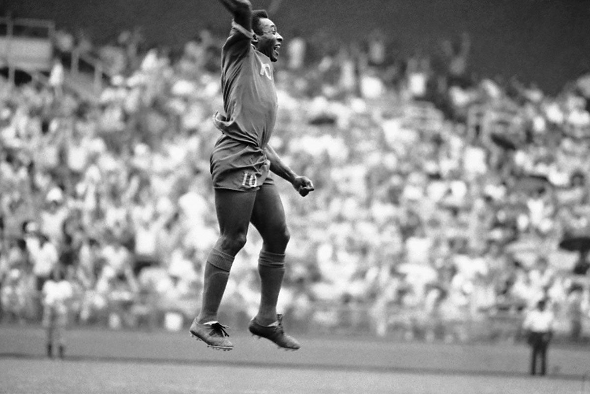 New York Cosmos soccer star Pele, who is from Brazil, leaps high in the air after scoring a goal during game with the Washington Diplomats in Washington on Sunday, June 29, 1975. Pele scored two goals and assisted on two others as the Cosmos whipped the Diplomats 9 to 2. (AP Photo)