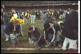 22 Dec 1996:  Washington Redskins fans tear up the turf at RFK Stadium in Washington, D. C. after a game against the Dallas Cowboys.  The Redskins, playing their last game at RFK, won 37-7. The game was the Redskins final game played at RFK. Mandatory Cre