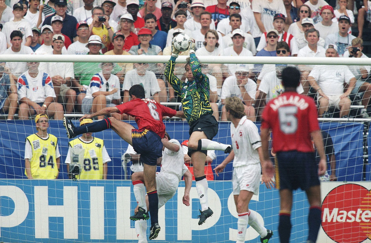 Switzerland goalkeeper Marco Pascolo, right, leaps to stop a shot on the goal by Spanish midfielder Hierro, left, during the Spain Vs. Switzerland World Cup soccer championship second round match, Saturday, July 2, 1994 at Washington?s RFK Stadium. (AP Photo/Doug Mills)
