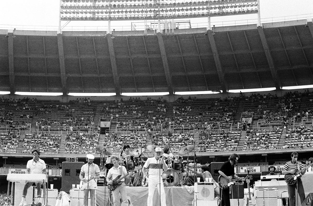 After being booted from the National Mall, the Beach Boys perform their opening number at RFK Stadium in Washingto, June 12, 1983. The Beach Boys held their concert after the Team America-Ft. Lauderdale Strikers soccer game. (AP Photo/Ira Schwarz)