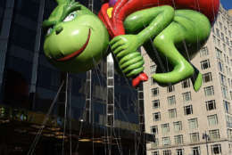 NEW YORK, NY - NOVEMBER 23:  The Dr. Seuss Grinch and Max balloon floats down Central Park West and into Columbus Circle during the 91st Annual Macy's Thanksgiving Day Parade on November 22, 2017 in New York City.  (Photo by Michael Loccisano/Getty Images)