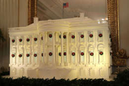 WASHINGTON, DC - NOVEMBER 27:  The White House gingerbread house is on display in the State Dining Room at the White House during a press preview of the 2017 holiday decorations November 27, 2017 in Washington, DC. The theme of the White House holiday decorations this year is "Time-Honored Traditions."  (Photo by Alex Wong/Getty Images)