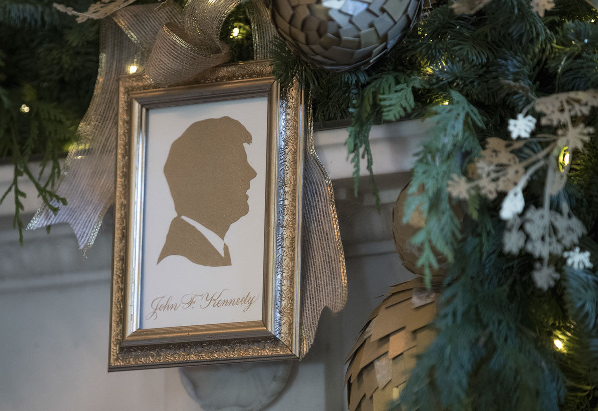 A silhouette of President John F. Kennedy is seen in the Green Room among the 2017 holiday decorations in the White House in Washington, Monday, Nov. 27, 2017. (AP Photo/Carolyn Kaster)