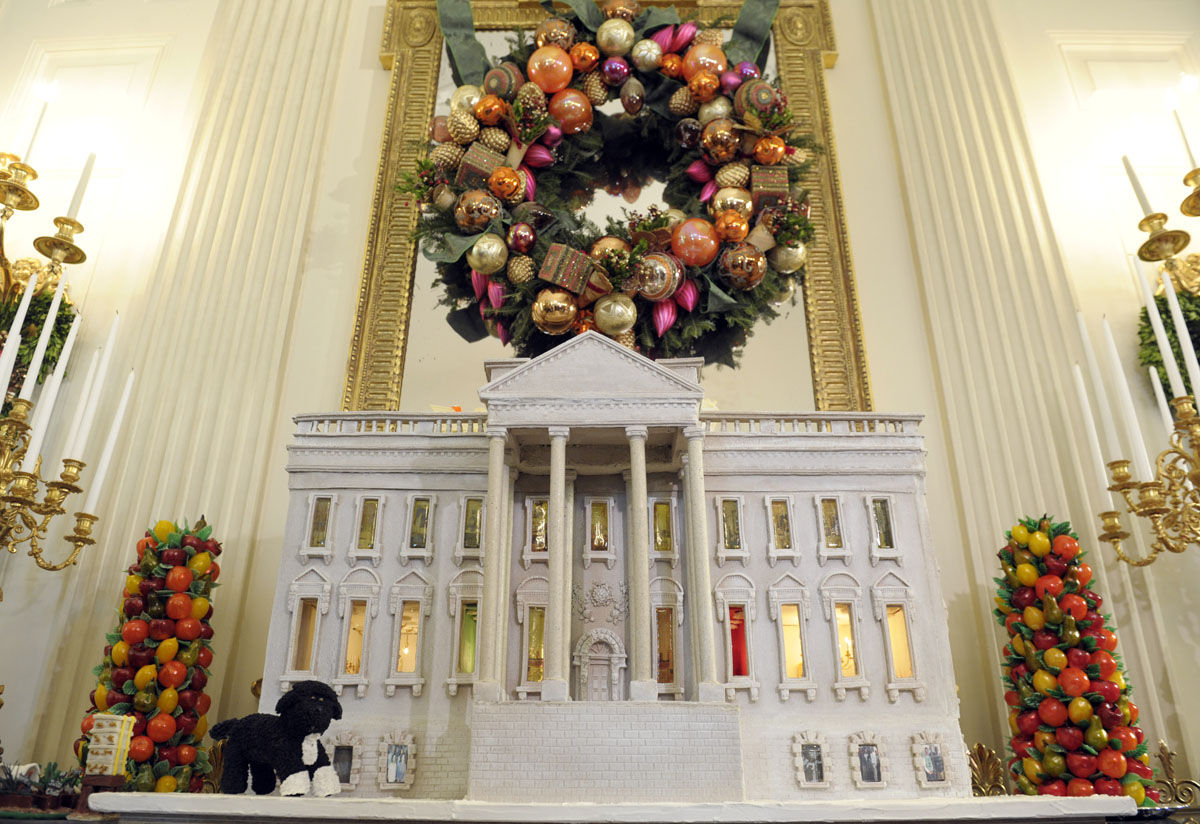 Bo, the Obama family pet, is replicated on the nearly 300-pound gingerbread house of the White House on display in the State Dining Room of the White House in Washington, Wednesday, Nov. 28, 2012. The theme for the White House Christmas 2012 is Joy to All. The White House gingerbread house has been a tradition since the 1960s. (AP Photo/Susan Walsh)