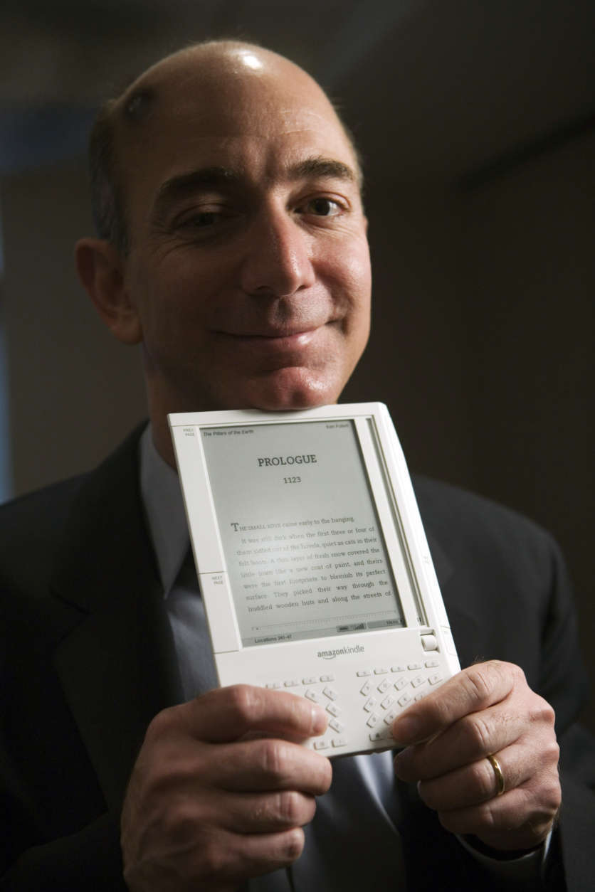 Jeff Bezos, founder and CEO of Amazon.com, introduces the Kindle at a news conference on Monday, Nov. 19, 2007 in New York. The $399 electronic book device will allow downloads of more than 90,000 book titles, blogs, magazines and newspapers. (AP Photo/Mark Lennihan)