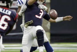 Houston Texans quarterback Tom Savage (3) is hit by Indianapolis Colts inside linebacker Jon Bostic (57) as he tries to throw during the first half of an NFL football game Sunday, Nov. 5, 2017, in Houston. (AP Photo/David J. Phillip)