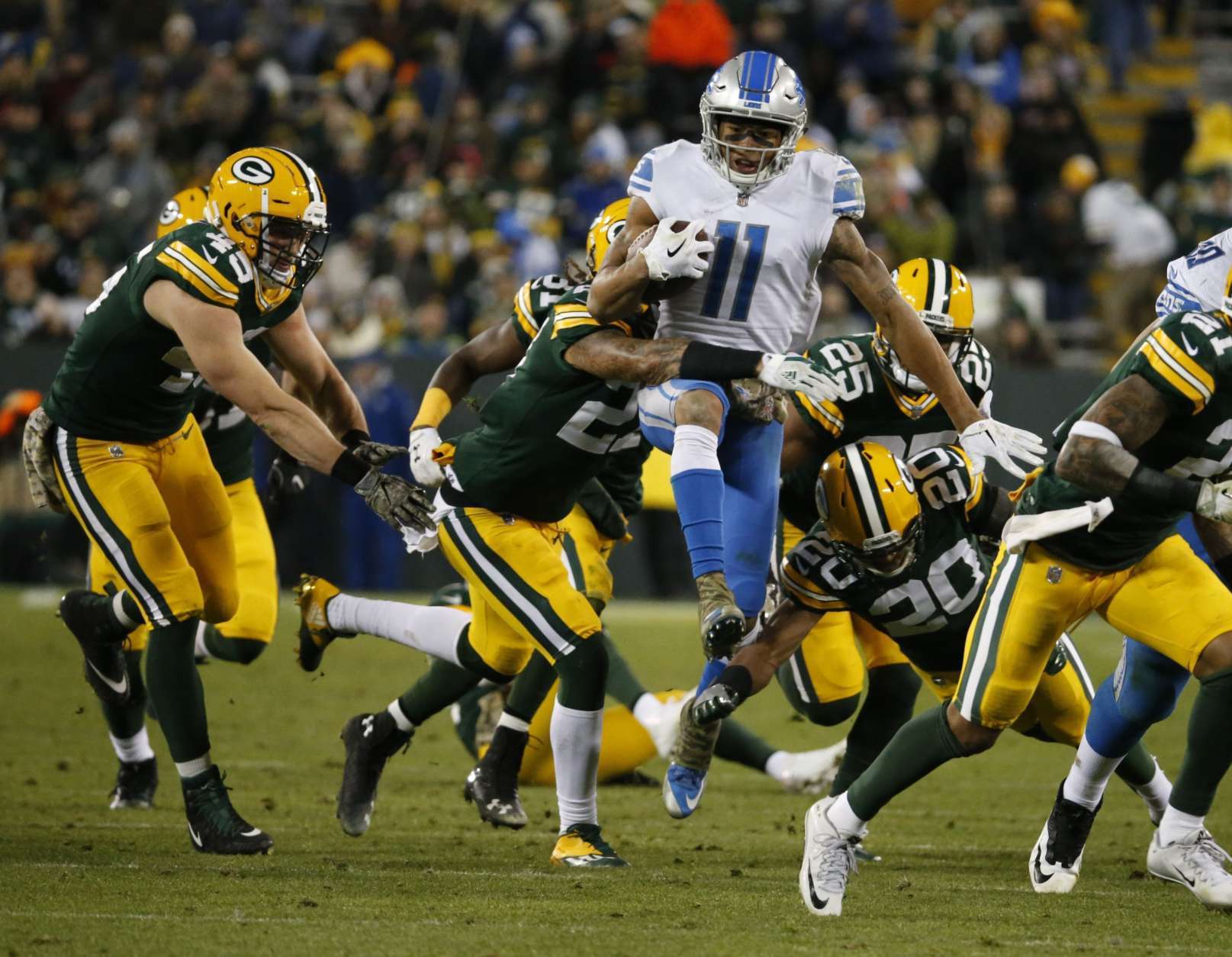 Detroit Lions' Marvin Jones is stopped after a catch during the second half of an NFL football game against the Green Bay Packers Monday, Nov. 6, 2017, in Green Bay, Wis. The Lions won 30-17. (AP Photo/Mike Roemer)