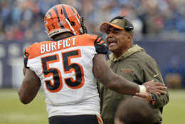 Cincinnati Bengals head coach Marvin Lewis talks with outside linebacker Vontaze Burfict (55) after Burfict was ejected for making contact with an official in the first half of an NFL football game against the Tennessee Titans Sunday, Nov. 12, 2017, in Nashville, Tenn. (AP Photo/Mark Zaleski)