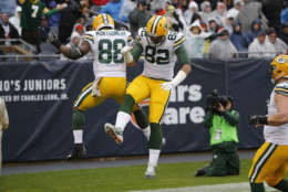 Green Bay Packers running back Ty Montgomery (88) celebrates a touchdown with tight end Richard Rodgers (82) during the first half of an NFL football game against the Chicago Bears, Sunday, Nov. 12, 2017, in Chicago. (AP Photo/Charles Rex Arbogast)