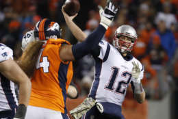 New England Patriots quarterback Tom Brady (12) throws against the Denver Broncos during the second half of an NFL football game, Sunday, Nov. 12, 2017, in Denver. (AP Photo/Jack Dempsey)