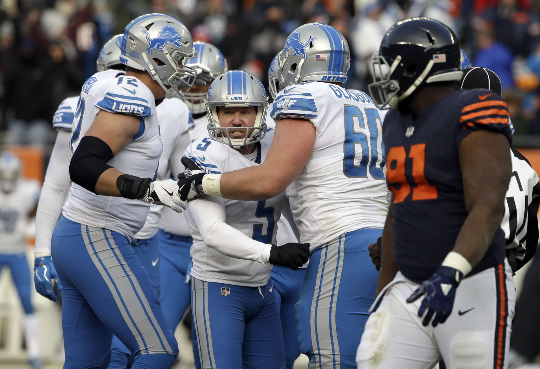 Detroit Lions kicker Matt Prater (5) celebrates his 52-yeard field goal during the second half of an NFL football game against the Chicago Bears, Sunday, Nov. 19, 2017, in Chicago. (AP Photo/Nam Y. Huh)