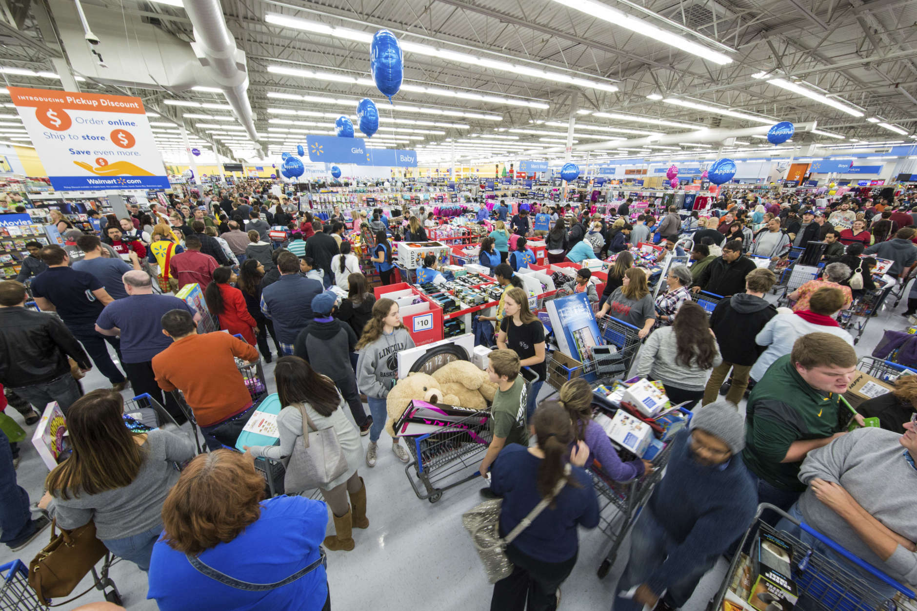 IMAGE DISTRIBUTED FOR WALMART - Holiday shoppers scored great deals at Walmart on Thursday, Nov. 23, 2017 in Bentonville, Ark. Color coded departments in Walmart stores helped customers locate top products across categories including electronics, toys, home, and apparel. (Gunnar Rathbun/AP Images for Walmart)
