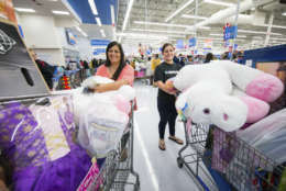 IMAGE DISTRIBUTED FOR WALMART - Customers secure Black Friday deals at a Walmart on Thursday, Nov. 23, 2017 in Bentonville, Ark. This year, Walmart offered hundreds of Black Friday deals in stores and online across categories including TVs, electronics, toys, and gaming consoles. (Gunnar Rathbun/AP Images for Walmart)