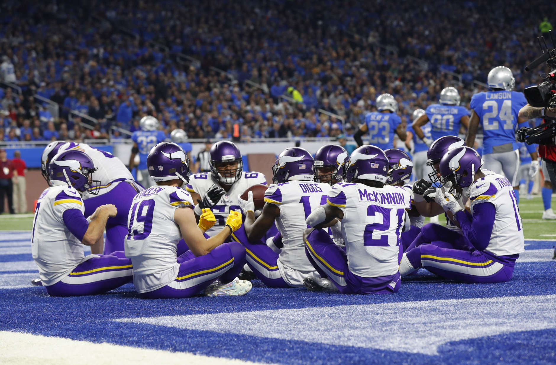 Minnesota Vikings players celebrate a Case Keenum touchdown by pretending to have Thanksgiving dinner in the end zone against the Detroit Lions during an NFL football game in Detroit, Thursday, Nov. 23, 2017. (AP Photo/Paul Sancya)