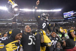 Pittsburgh Steelers kicker Chris Boswell (9) is carried off the field after kicking the game-winning field goal during the second half of an NFL football game against the Green Bay Packers in Pittsburgh, Sunday, Nov. 26, 2017. The Steelers won 31-28. (AP Photo/Don Wright)