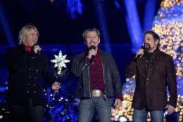 The Texas Tenors perform during the lighting ceremony for the 2017 National Christmas Tree on the Ellipse near the White House, Thursday, Nov. 30, 2017, in Washington. (AP Photo/Andrew Harnik)