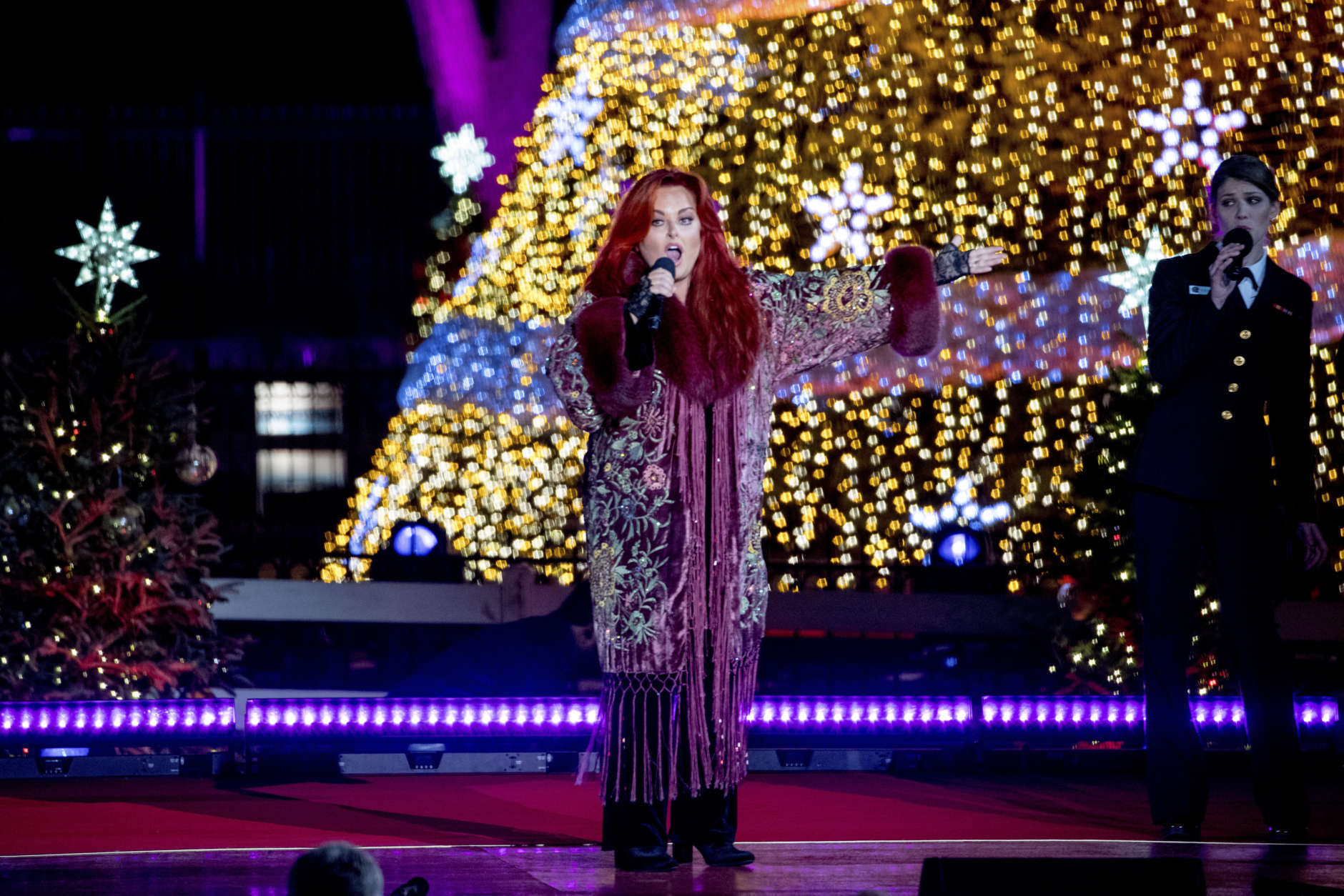 Wynonna performs during the lighting ceremony for the 2017 National Christmas Tree on the Ellipse near the White House, Thursday, Nov. 30, 2017, in Washington. (AP Photo/Andrew Harnik)