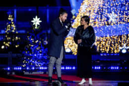 Us The Duo featuring Michael and Carissa Alvarado perform during the lighting ceremony for the 2017 National Christmas Tree on the Ellipse near the White House, Thursday, Nov. 30, 2017, in Washington. (AP Photo/Andrew Harnik)