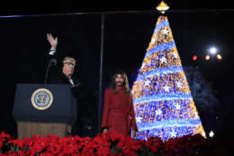 President Donald Trump with first lady Melania Trump waves as they leave the lighting ceremony for the 2017 National Christmas Tree on the Ellipse near the White House in Washington, Thursday, Nov. 30, 2017. (AP Photo/Manuel Balce Ceneta)