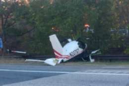 Anne Arundel County Fire Department responded to the ramp from Interstate 97 to Route 665, where the single engine plane crashed at around 4:30 p.m. (Courtesy Anne Arunel County Fire Department) 