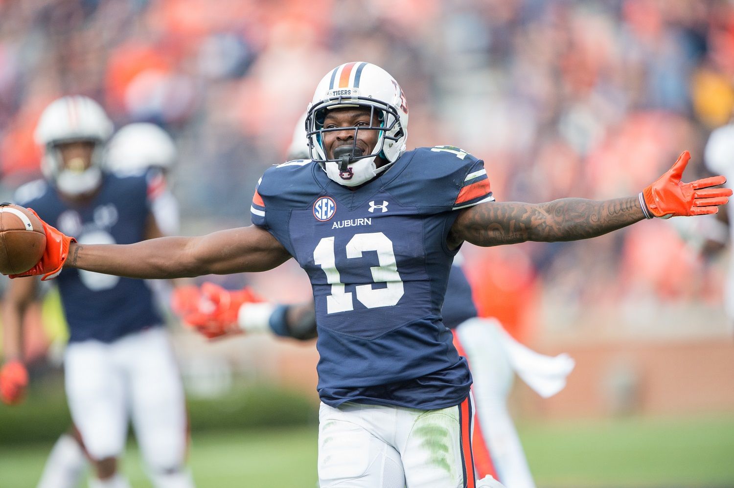 AUBURN, AL - NOVEMBER 18: Defensive back Javaris Davis #13 of the Auburn Tigers celebrates after a big play during their game against the Louisiana Monroe Warhawks at Jordan-Hare Stadium on November 18, 2017 in Auburn, Alabama. (Photo by Michael Chang/Getty Images)