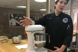 Caedan Ackerman, a student in the culinary arts program, bakes donuts during his free lab on Thursday, November 2, 2017. (Georgia Slater/Capital News Service)