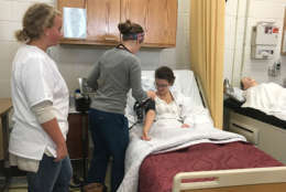 Students in the honors academy of health program learn and practice how to test vitals on one another on Thursday, November 2, 2017. (Georgia Slater/Capital News Service)