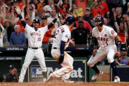 HOUSTON, TX - OCTOBER 29: Alex Bregman #2 of the Houston Astros celebrates after scoring on a double by Jose Altuve #27 (not pictured) during the seventh inning against the Los Angeles Dodgers in game five of the 2017 World Series at Minute Maid Park on October 29, 2017 in Houston, Texas.  (Photo by Jamie Squire/Getty Images)