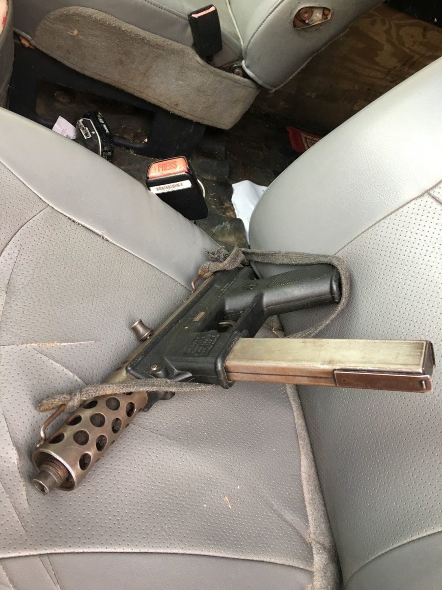 A photo of a firearm recovered from driver's seat of the suspects' vehicle. Four suspects are in custody, police said. (Courtesy Montgomery County police)