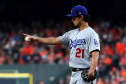 HOUSTON, TX - OCTOBER 27:  Yu Darvish #21 of the Los Angeles Dodgers reacts during the second inning against the Los Angeles Dodgers in game three of the 2017 World Series at Minute Maid Park on October 27, 2017 in Houston, Texas.  (Photo by Tom Pennington/Getty Images)