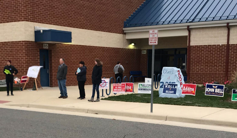 Just over an hour into Election Day, election chief at Lunsford Middle School says says turn out is moderate for a non-presidential election. (WTOP/Neal Augenstein)