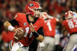 ATHENS, GA - NOVEMBER 18: Jake Fromm #11 of the Georgia Bulldogs rolls out on a pass play during the second half against the Kentucky Wildcats at Sanford Stadium on November 18, 2017 in Athens, Georgia. (Photo by Daniel Shirey/Getty Images)