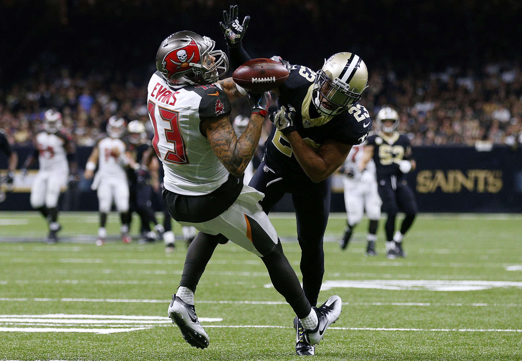 NEW ORLEANS, LA - NOVEMBER 05:  Marshon Lattimore #23 of the New Orleans Saints breaks up a pass intended for Mike Evans #13 of the Tampa Bay Buccaneers during the second half of a game at Mercedes-Benz Superdome on November 5, 2017 in New Orleans, Louisiana.  (Photo by Jonathan Bachman/Getty Images)