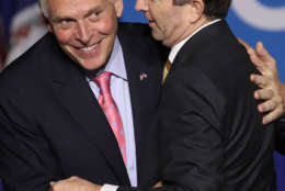 FAIRFAX, VA - NOVEMBER 07:  Virginia Gov.-elect Ralph Northam (R) is embraced by current Gov. Terry McAuliffe (L) at an election night rally November 7, 2017 in Fairfax, Virginia. Northam defeated Republican candidate Ed Gillespie.  (Photo by Win McNamee/Getty Images)
