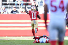 SANTA CLARA, CA - NOVEMBER 12:  Marquise Goodwin #11 of the San Francisco 49ers breaks a tackle from Janoris Jenkins #20 of the New York Giants on his way to an 83-yard touchdown against the New York Giants during their NFL game at Levi's Stadium on November 12, 2017 in Santa Clara, California.  (Photo by Thearon W. Henderson/Getty Images)