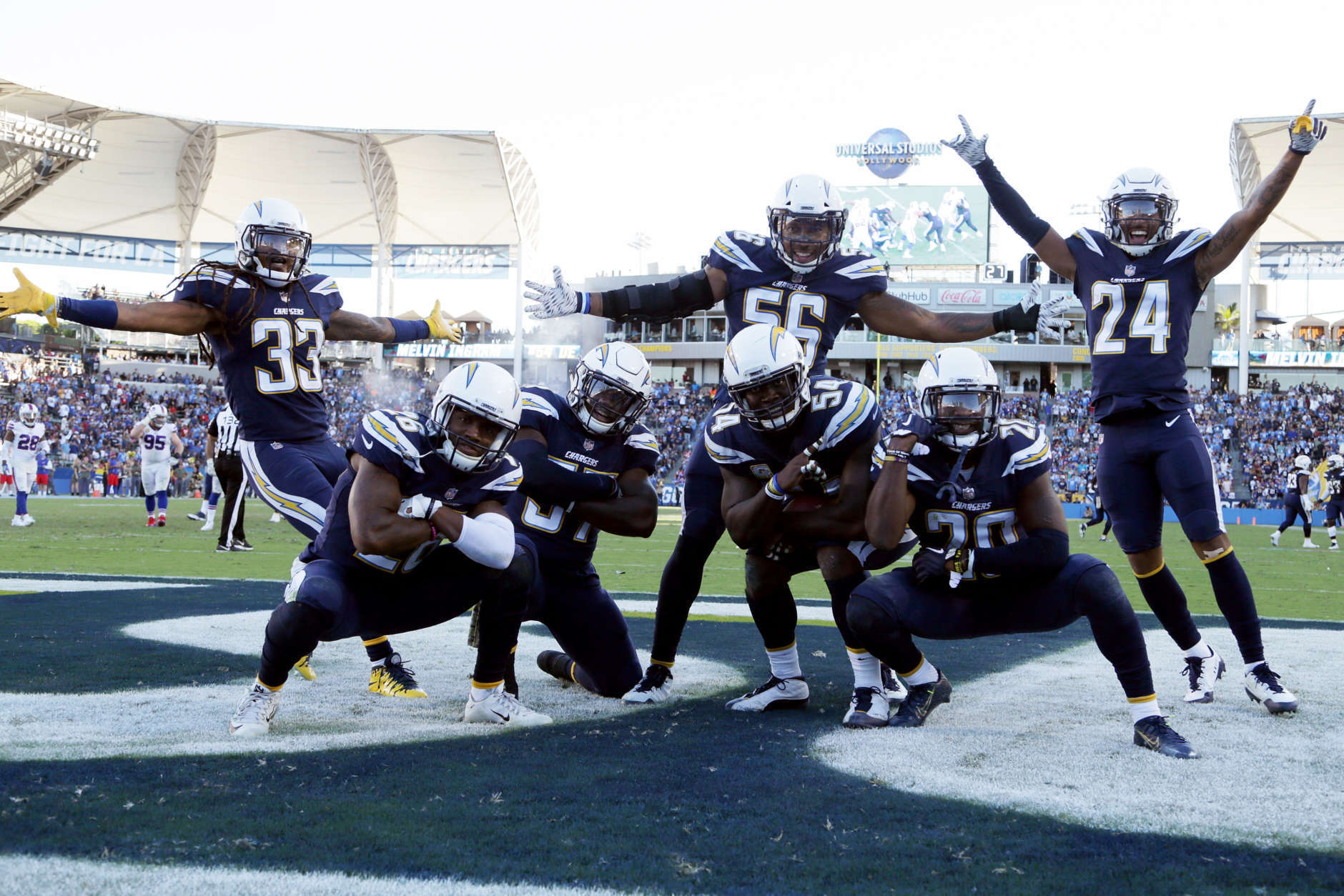 CARSON, CA - NOVEMBER 19: The Los Angeles Chargers defense celebrate after an interception during the NFL game against the Buffalo Bills at the StubHub Center on November 19, 2017 in Carson, California. (Photo by Jeff Gross/Getty Images)