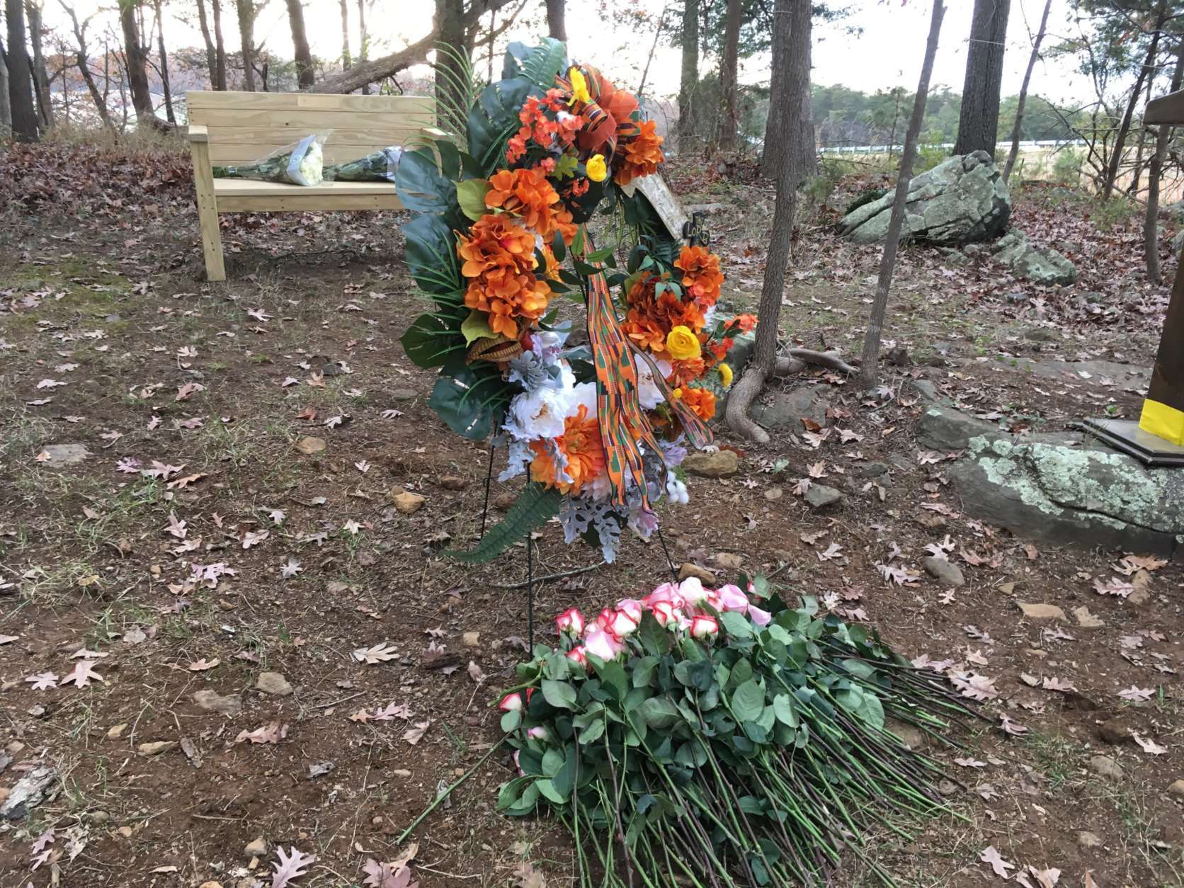 The interred at Belmont Slave Cemetery were honored with songs, prayers, a wreath and individual tributes of flowers at Sunday's march and walking tour. (WTOP/Liz Anderson)