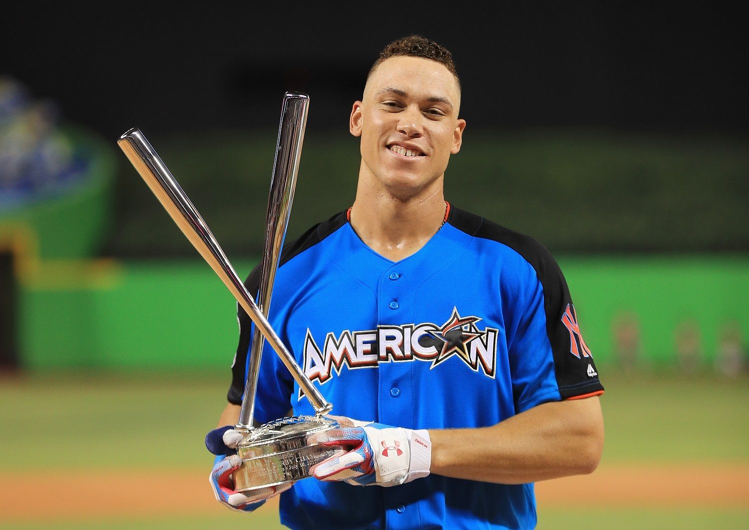 MIAMI, FL - JULY 10:  Aaron Judge #99 of the New York Yankees celebrates with the trophy after winning the T-Mobile Home Run Derby at Marlins Park on July 10, 2017 in Miami, Florida.  (Photo by Mike Ehrmann/Getty Images)