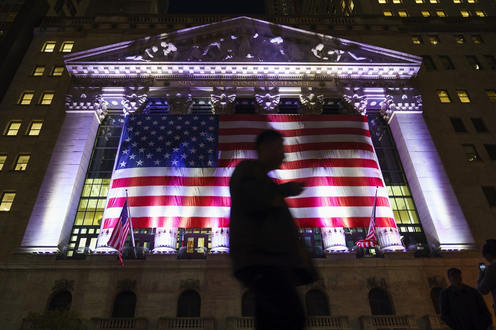 NEW YORK, NY - NOVEMBER 10: An American flag hangs on facade of the New York Stock Exchange (NYSE) for Veterans Day, November 10, 2017 in New York City. The United States will mark Veterans Day this Saturday, November 11. (Drew Angerer/Getty Images)