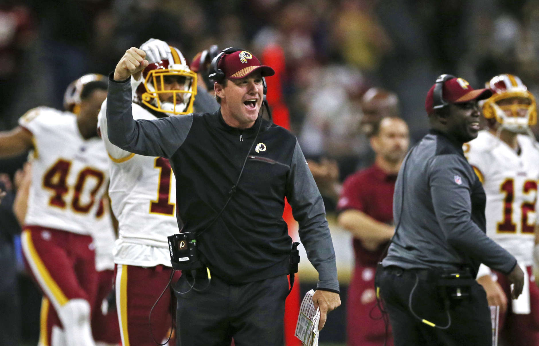 Washington Redskins head coach Jay Gruden reacts after a touchdown repletion by tight end Jeremy Sprinkle in the second half of an NFL football game against the New Orleans Saints in New Orleans, Sunday, Nov. 19, 2017. (AP Photo/Rusty Costanza)